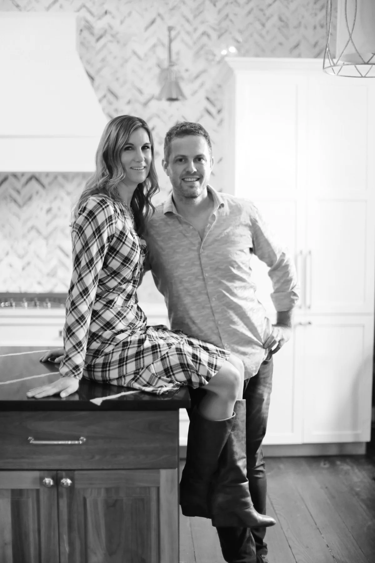 Holly and Dave Thompson in a kitchen they designed