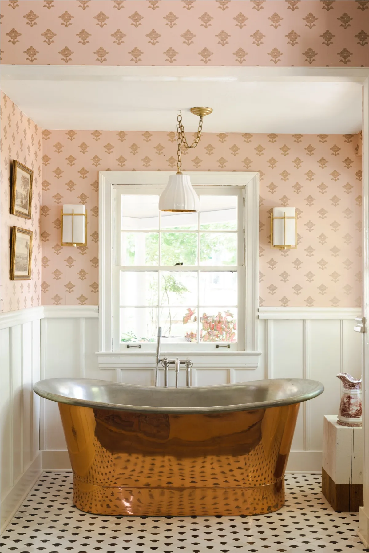 Bathroom with copper soaking tub and blush wallpaper
